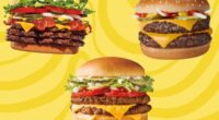 three burgers on a yellow background