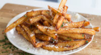 homemade truffle french fries with parmesan in a plate