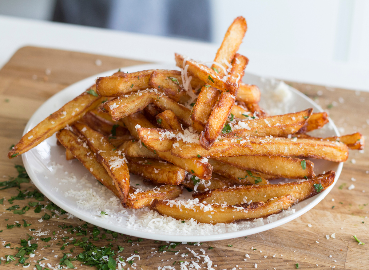 homemade truffle french fries with parmesan in a plate