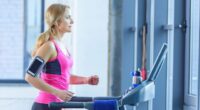 woman performing cardio treadmill workout