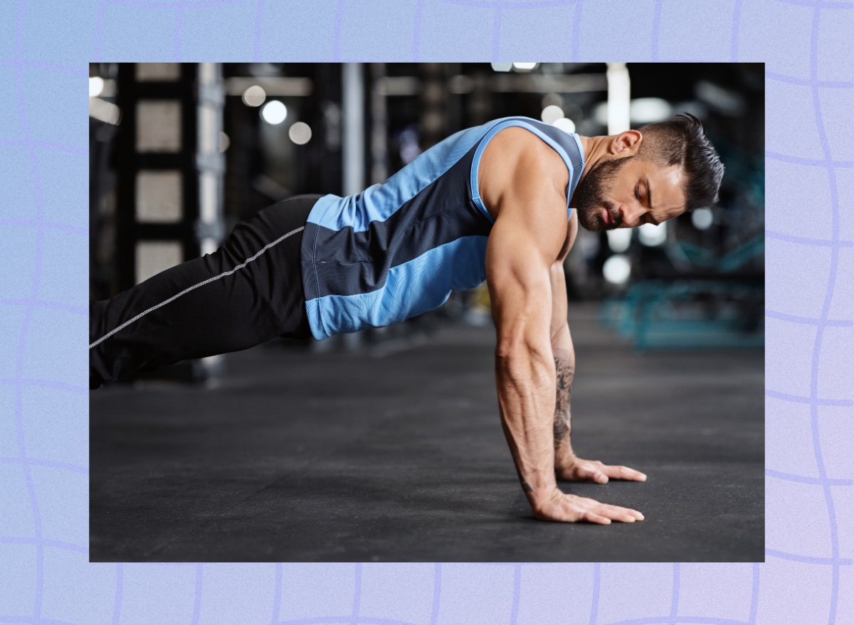 fit man doing pushup exercise at the gym