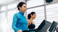 middle-aged woman on treadmill demonstrating mistakes that sabotage your weight loss