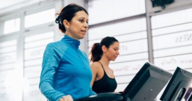 middle-aged woman on treadmill demonstrating mistakes that sabotage your weight loss