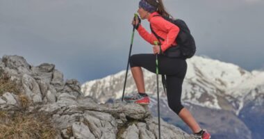 woman on uphill hike in mountains