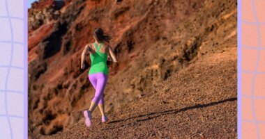 fit woman running uphill on a desert run