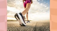 close-up of woman power walking on road on sunny day