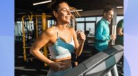 happy, fit woman running on treadmill at the gym