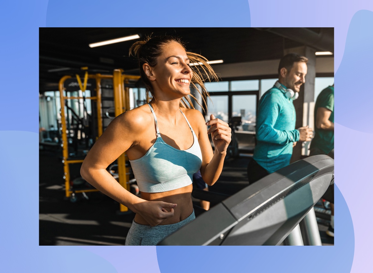 happy, fit woman running on treadmill at the gym