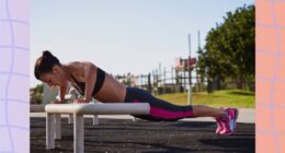 fit woman doing incline pushups outdoors at park