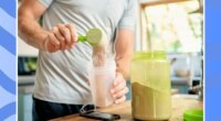 man making a protein shake on a blue background