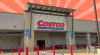 Costco exterior on striped red background