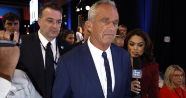 RFK Jr. Shows Up To 2024 Debate With Copycat Trump Tan And We're Embarrassed For Him