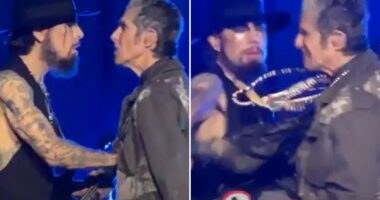 Shocking moment lead singer of iconic rock band punches guitarist mid-song as fans fear gig might have been the last one