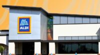 Aldi storefront on patterned orange background