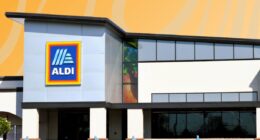 Aldi storefront on patterned orange background