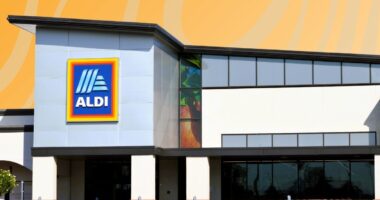 Aldi storefront on patterned orange background