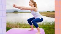 fit woman doing squats on yoga mat near lake