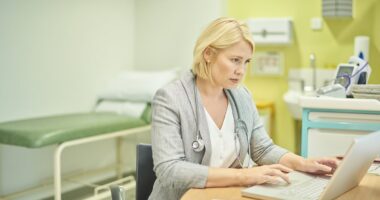 The computer will see you now! One in five GPs are using AI to make diagnoses and write notes despite risk of errors