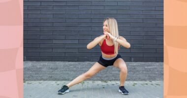 blonde woman doing side lunge exercise outside on sidewalk