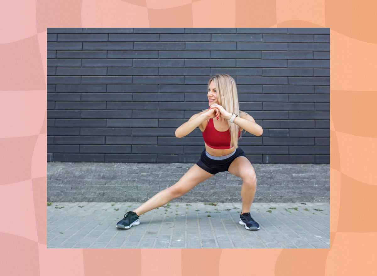 blonde woman doing side lunge exercise outside on sidewalk