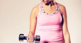 Woman holding dumbbell bicep curls