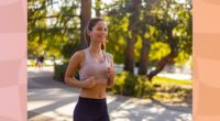 happy brunette woman doing light jogging in a park on a sunny day