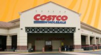 costco storefront set against an orange bckground