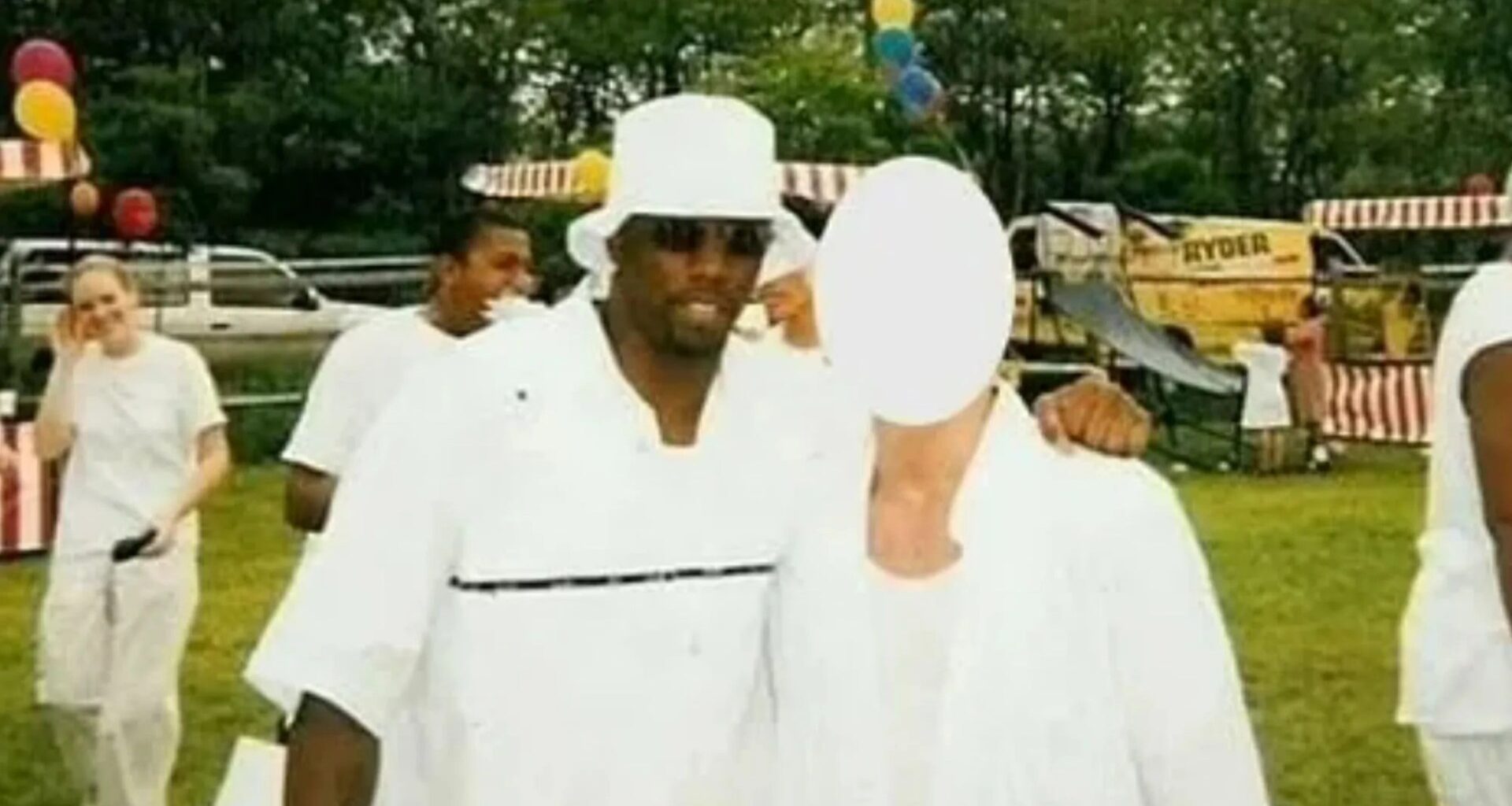 Diddy pictured with his arm around ’16-year-old child sex assault victim’ at ‘White Party’ hours before ‘attacking him’