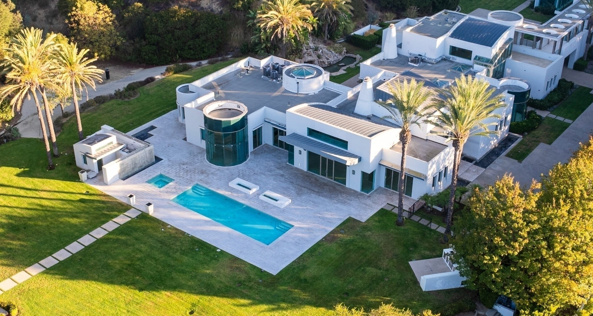 Kanye West drops $35M on Beverly Hills home featuring 18 bathrooms & tennis court after selling crumbling Malibu mansion