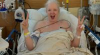 Nineties rock frontwoman tells fans she’s ‘alive’ as she reveals ‘major surgery’ in post from hospital bed