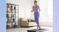 fit woman doing treadmill walking pad workout at home in bright living space