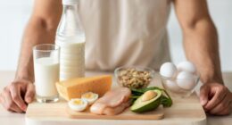 cutting board with different protein foods on it in the kitchen