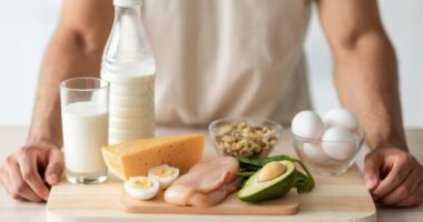 cutting board with different protein foods on it in the kitchen