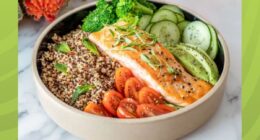 a photo of a protein salmon bowl on a designed green background