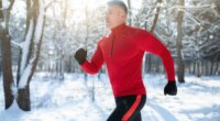 man running outdoors in the snow, healthy holiday habits for weight loss