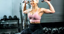 mature, fit, and strong woman holding dumbbells flexing her muscles at the gym, concept of exercises for upper-body strength as you age