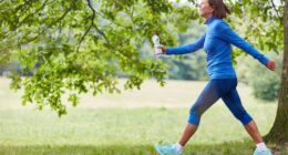 mature woman on brisk walk on trails, concept of low-impact exercises to melt belly fat