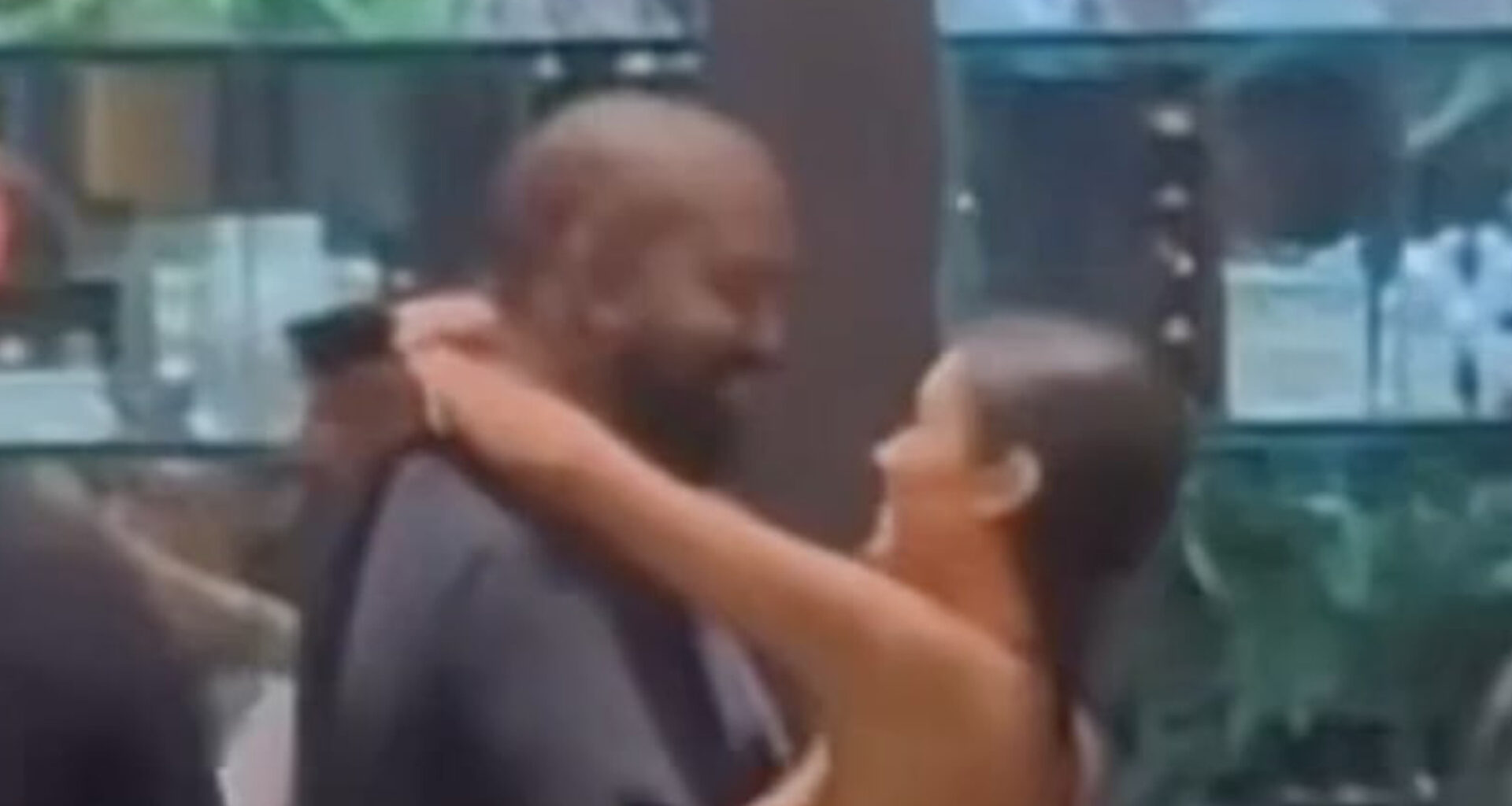 Bianca Censori goes nearly topless as she wraps her arms around smiling husband Kanye West at Tokyo shop