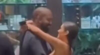 Bianca Censori goes nearly topless as she wraps her arms around smiling husband Kanye West at Tokyo shop