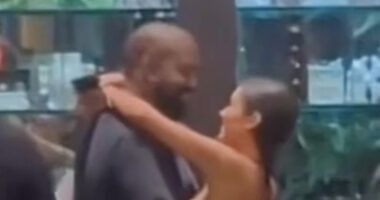 Bianca Censori goes nearly topless as she wraps her arms around smiling husband Kanye West at Tokyo shop