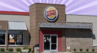 Burger King exterior on striped purple background