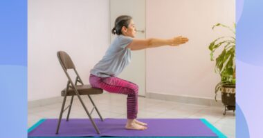 mature woman doing chair yoga exercise