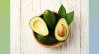 bowl of avocados on wood table