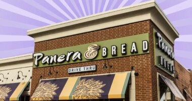 The storefront of a Panera Bread restaurant set against a vibrant purple background.