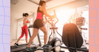 lineup of a treadmill, elliptical, and exercise bike at the gym in front of floor-to-ceiling windows with sun shining through