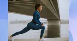 fit woman doing walking lunges outdoors