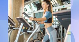 focused brunette woman using elliptical at the gym