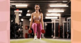 fit brunette woman doing dumbbell lunges at the gym