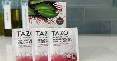 three Tazo black tea bags on countertop