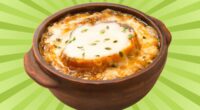 A crock of cheesy French onion soup set against a vibrant background